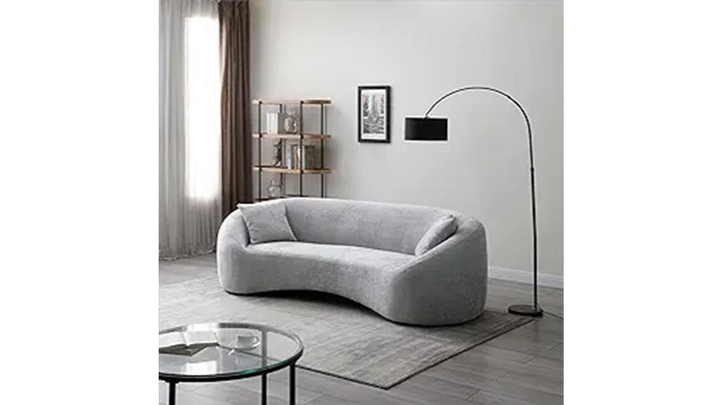 light gray curved sofa