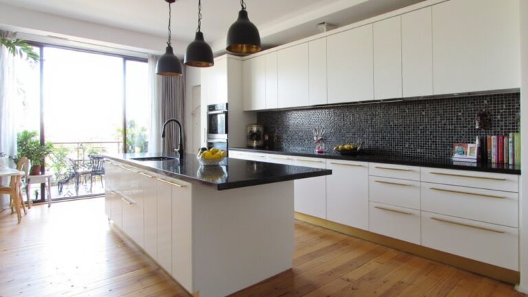 chic black white gold kitchens