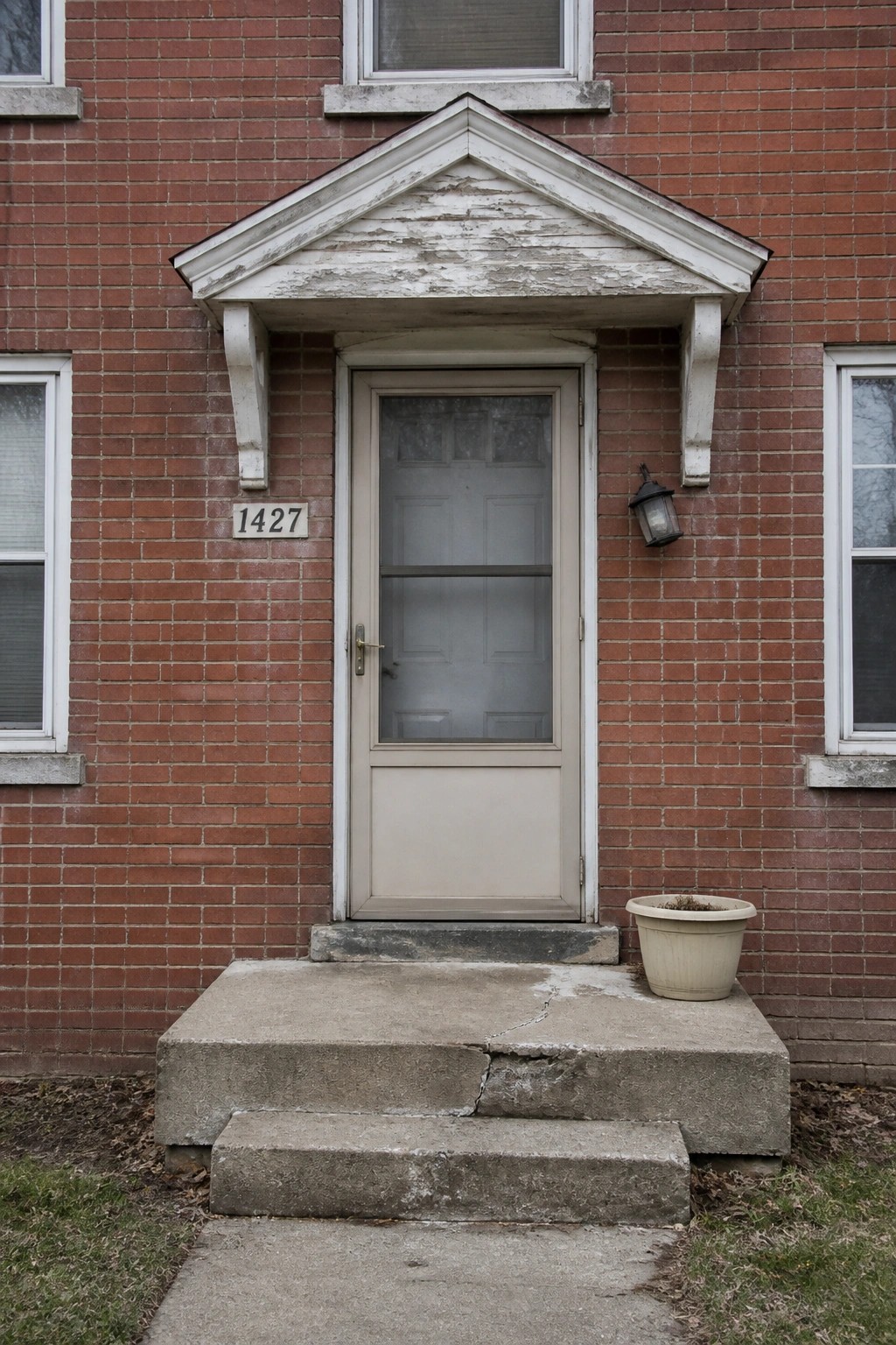 Before-and-after image of a plain brick front porch updated with repaired concrete steps, refreshed trim paint, and a planted container to define the entry.