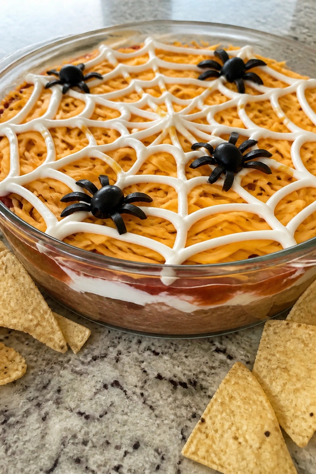 Spiderweb Layered Taco Dip with Tortilla Chips