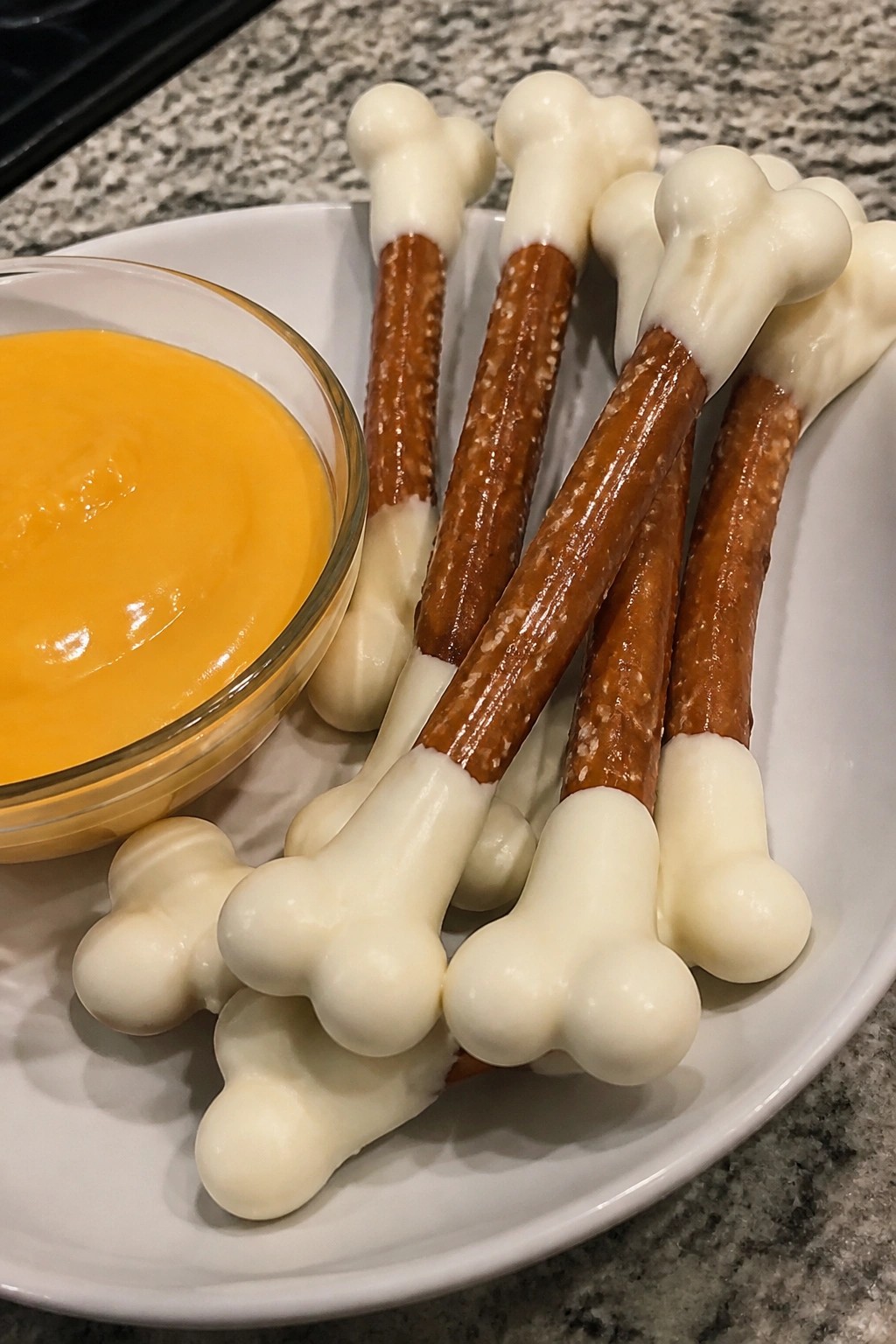 Skeleton Bone Pretzel Rods with Cheese Dip