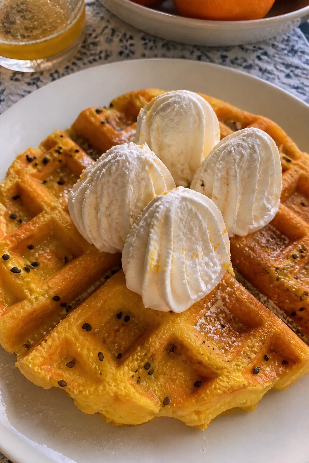 Orange-Black Sesame Waffles with Whipped Cream Tombstones