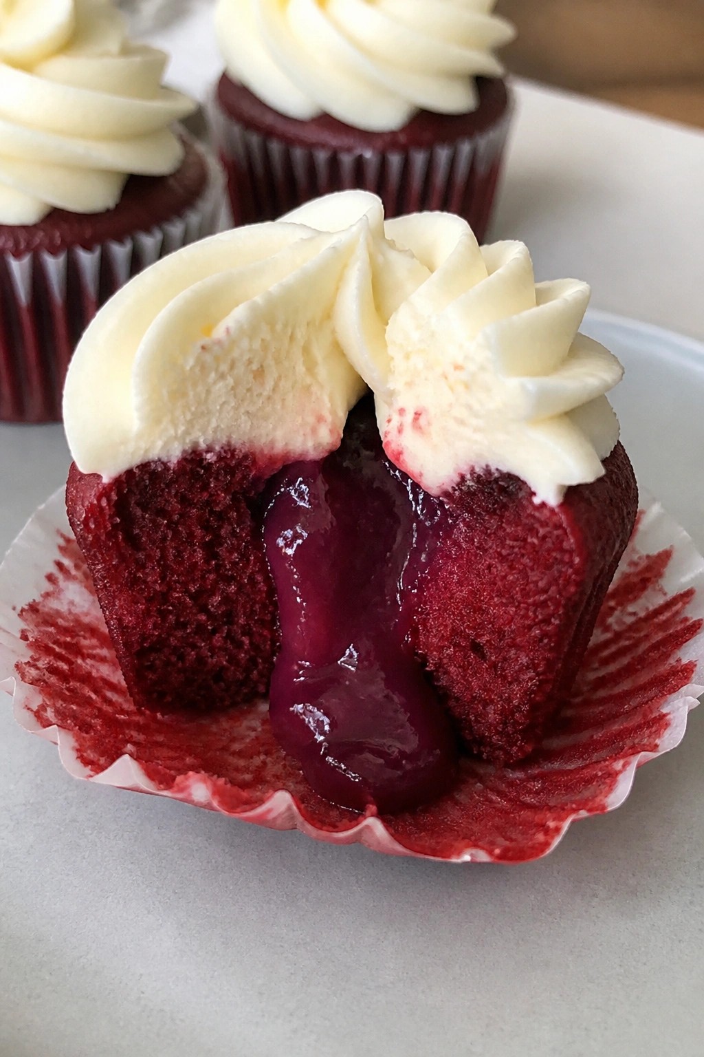 Bloody Red Velvet Cupcakes with Berry Filling