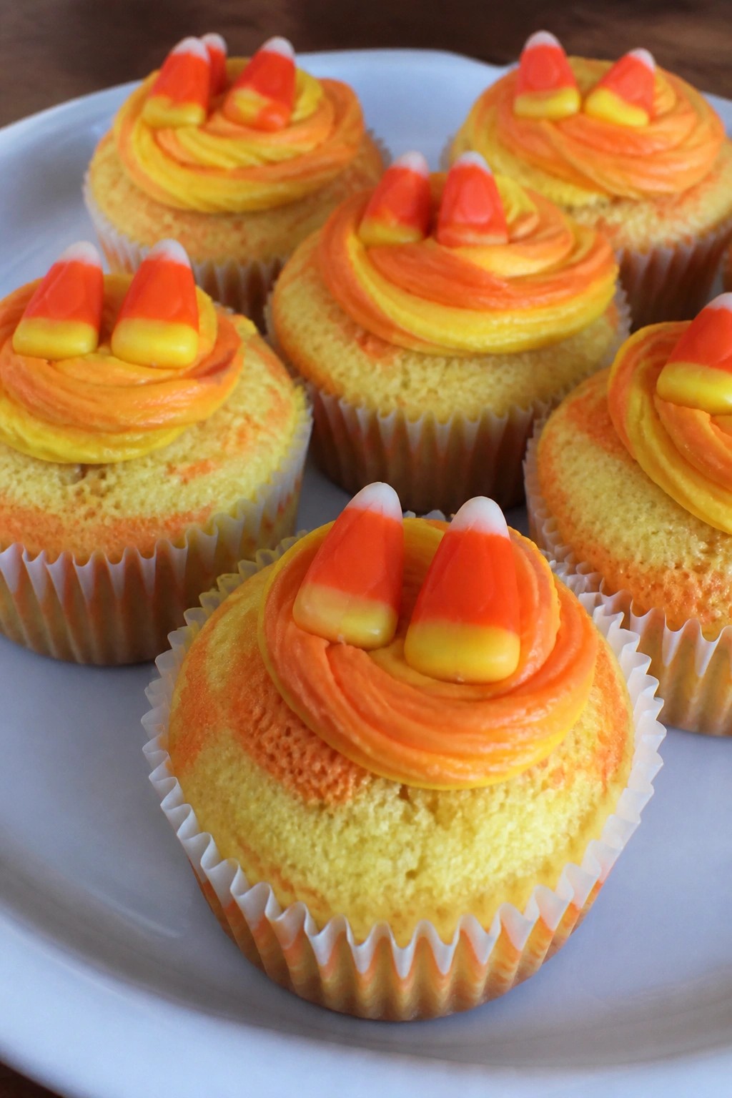 Candy Corn Swirled Yellow and Orange Cupcakes