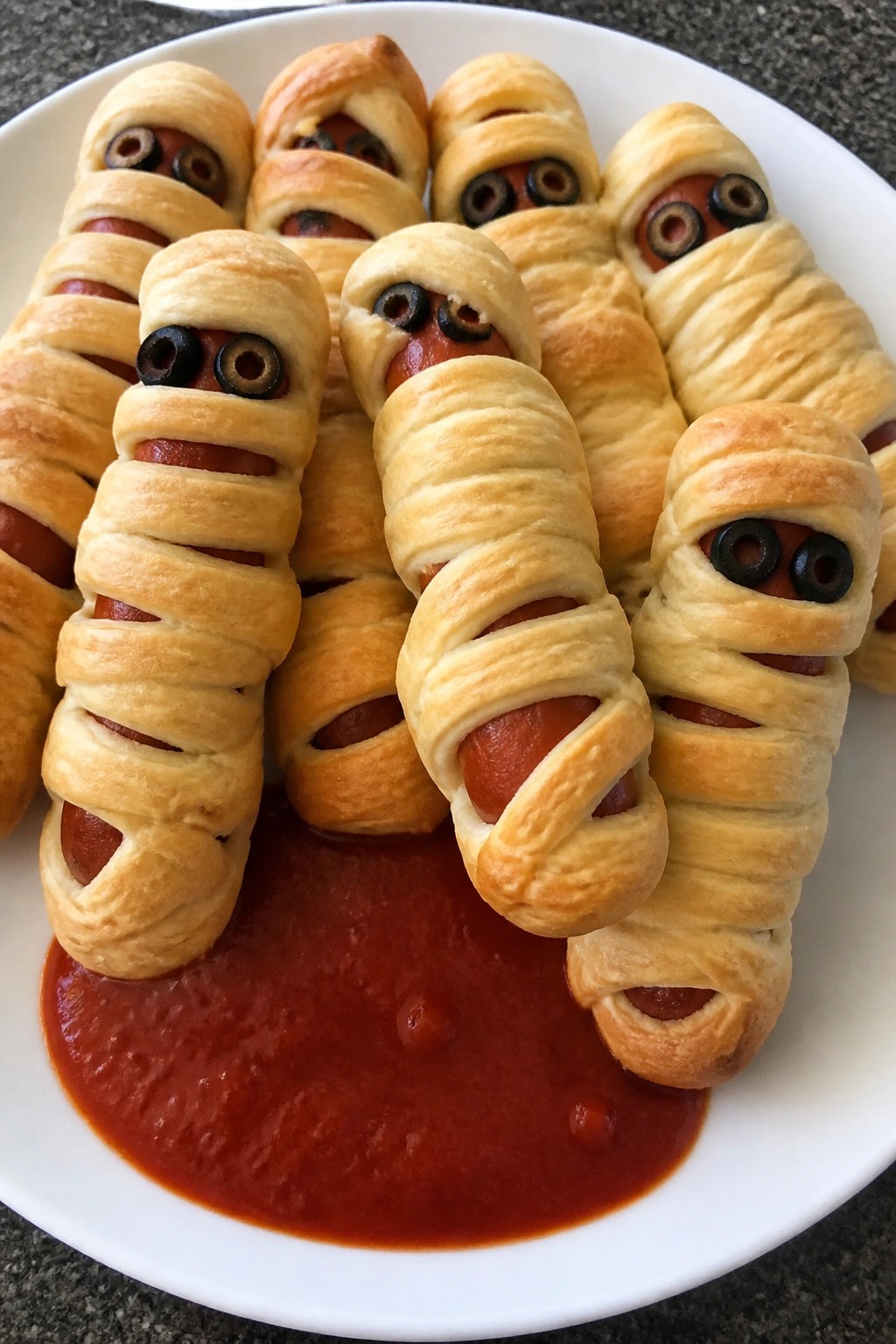 Baked Sausage Mummy Rolls with Marinara