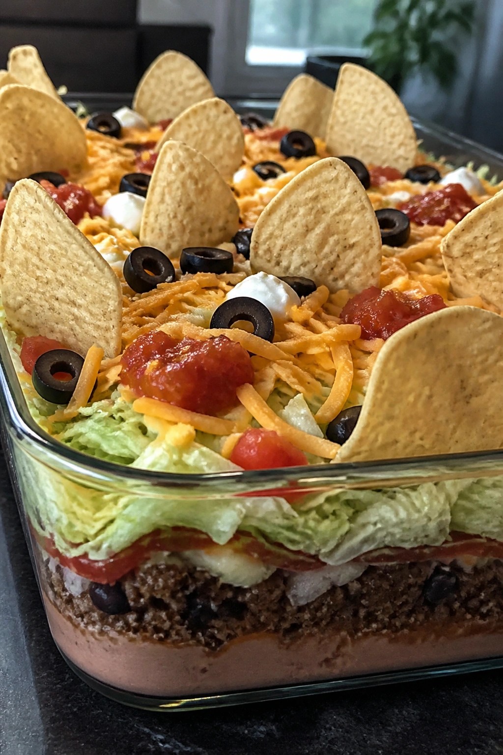 Graveyard Layered Taco Salad in a Baking Dish