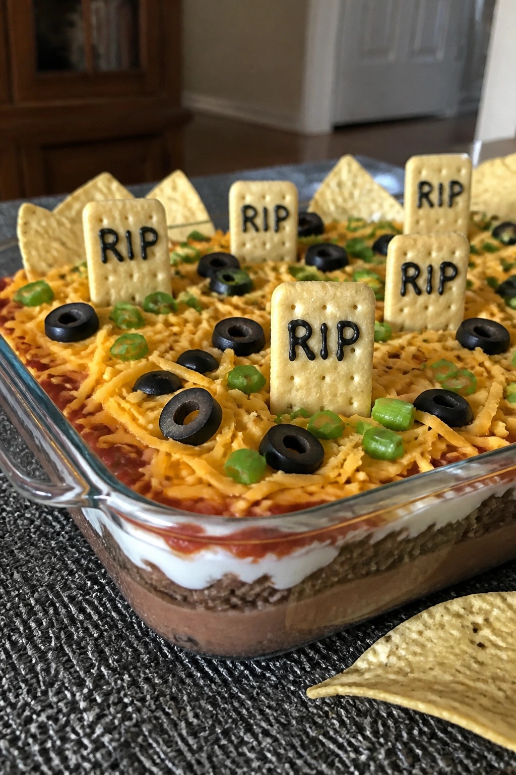 Graveyard Layered Taco Dip with Chips