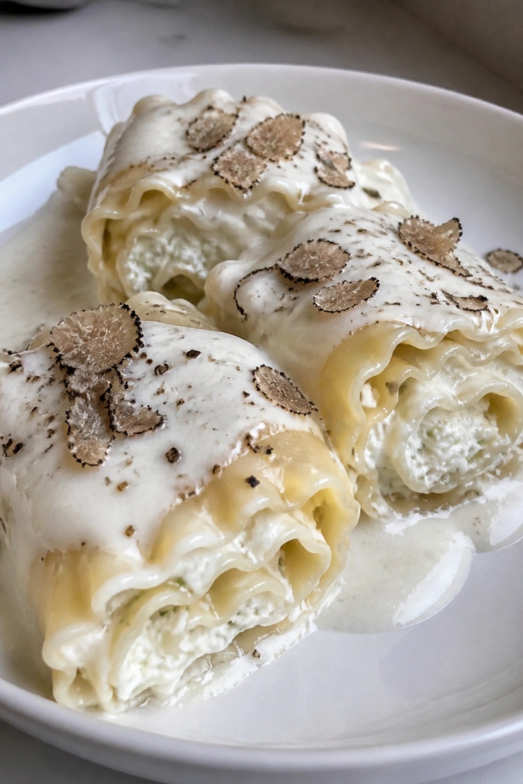 Ghostly White Lasagna Rolls with Ricotta and Truffle