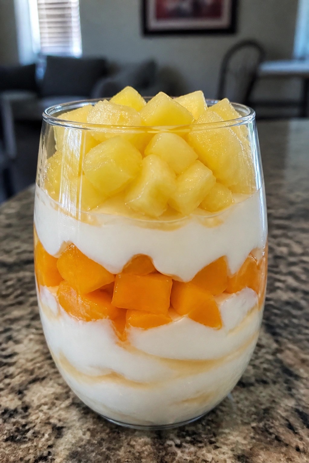 Candy Corn Yogurt Parfait with Mango and Pineapple Layers