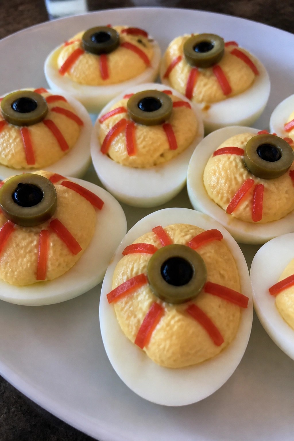 Eyeball Deviled Eggs with Olive and Red Pepper Details