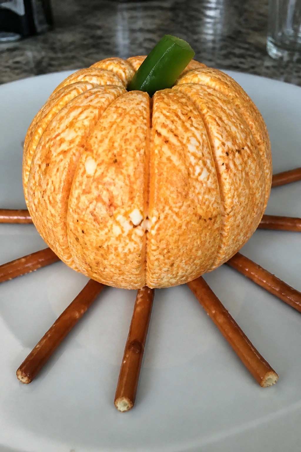 Pumpkin Cheese Ball with Pretzel Broomsticks