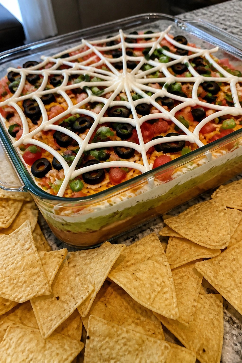 Spiderweb Seven-Layer Taco Dip with Tortilla Chips