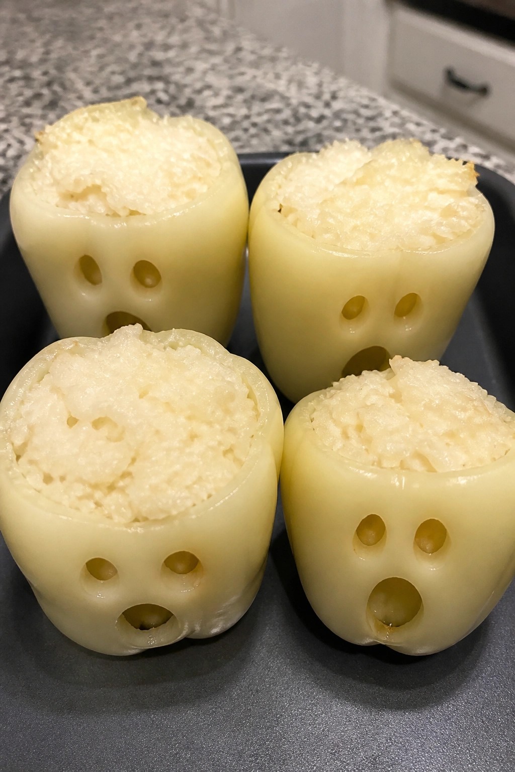 Ghostly Stuffed Bell Peppers with Rice and Cheese