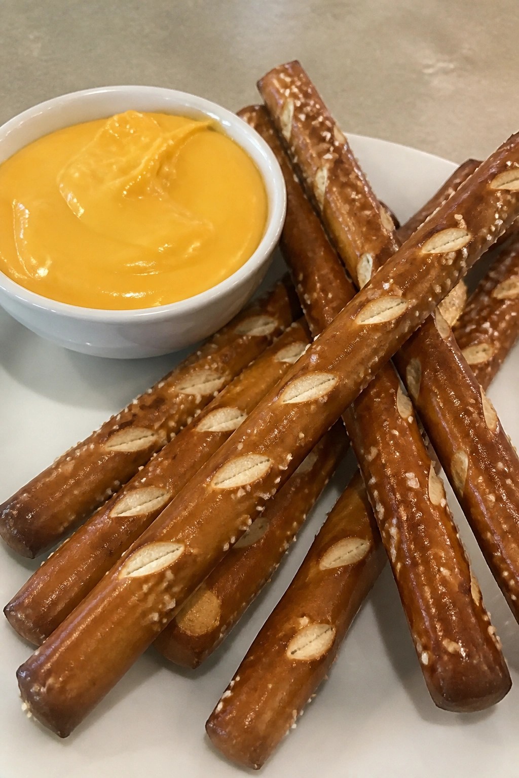 Skeleton Bone Pretzel Rods with Cheese Dip