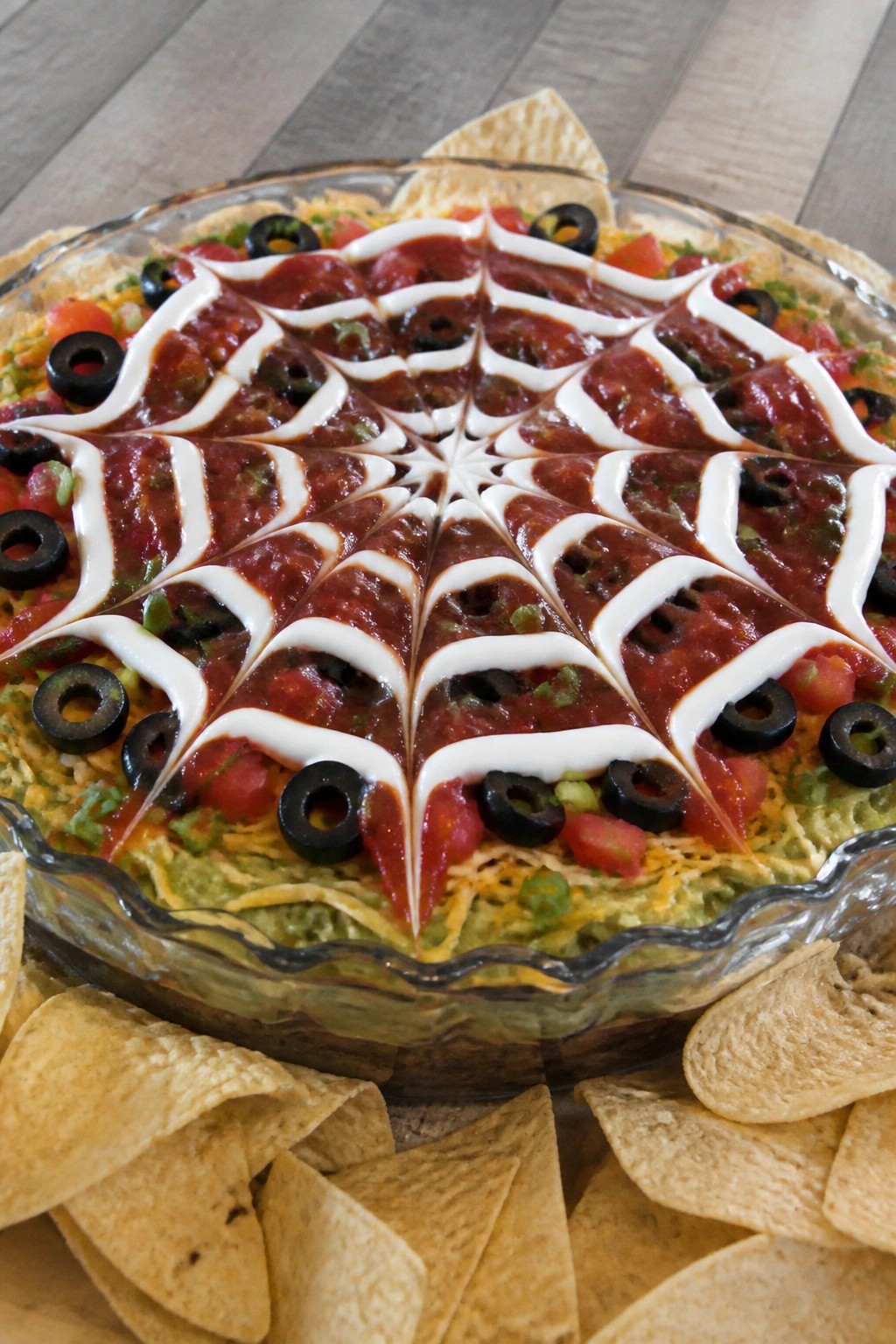 Spiderweb Seven-Layer Taco Dip with Tortilla Chips