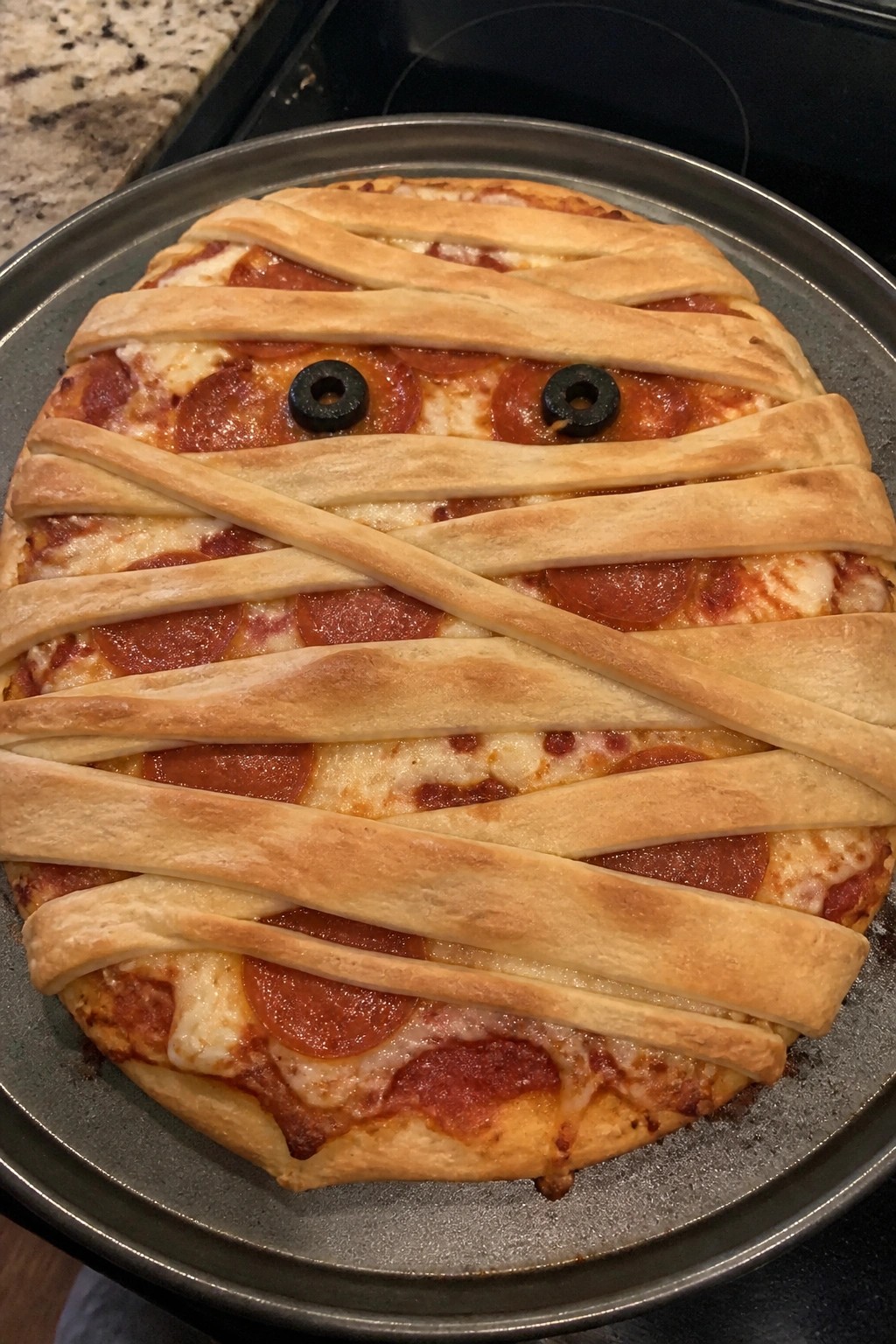 Mummy Pepperoni Pizza with Dough Wraps