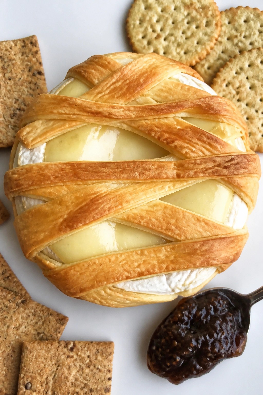 Mummy-Wrapped Brie with Fig Jam and Crackers