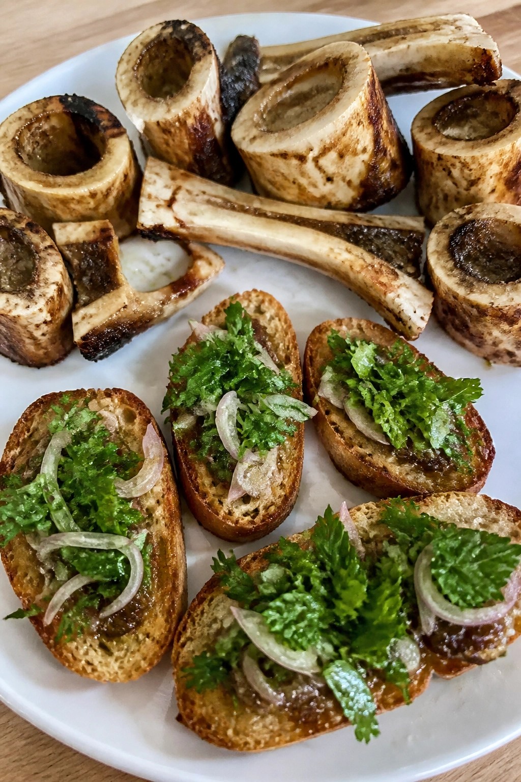 Skeleton Bone Marrow Crostini with Herb Salad