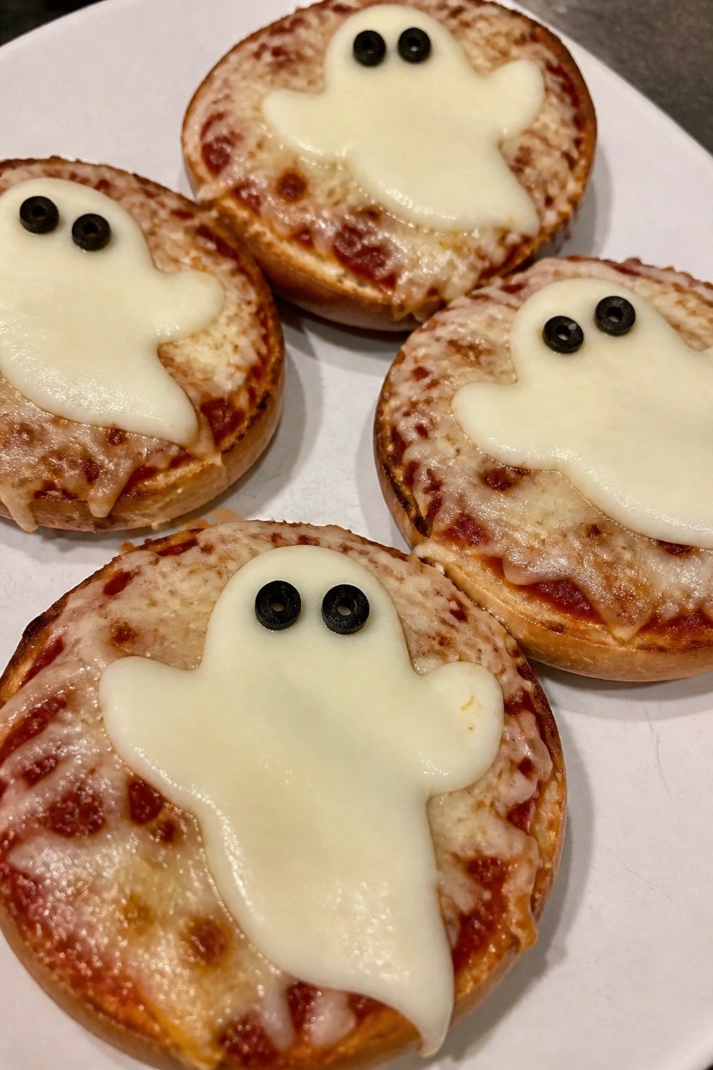 Ghostly Cheese Pizza Bagels
