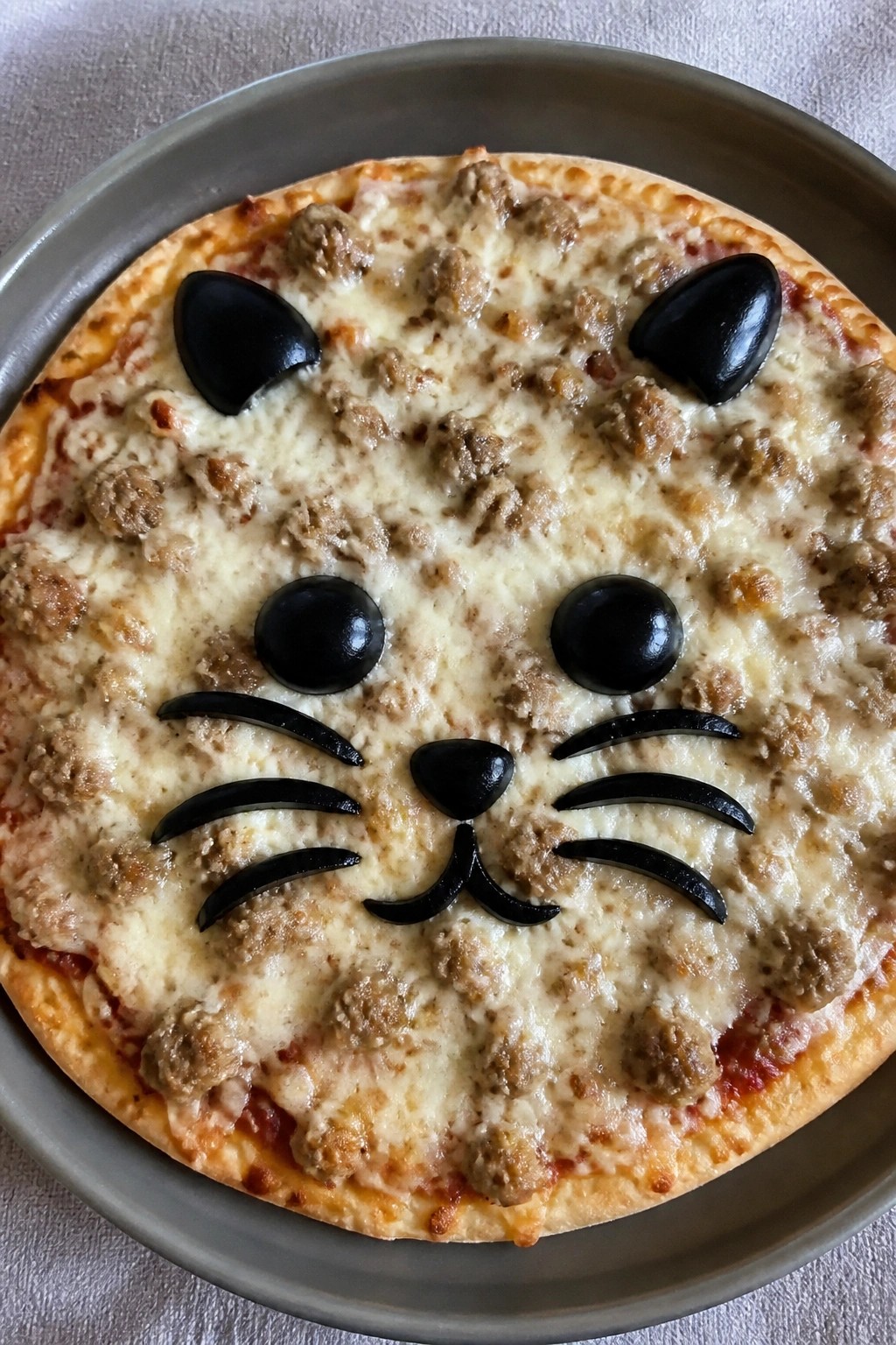 Black Cat Olive and Sausage Pizza