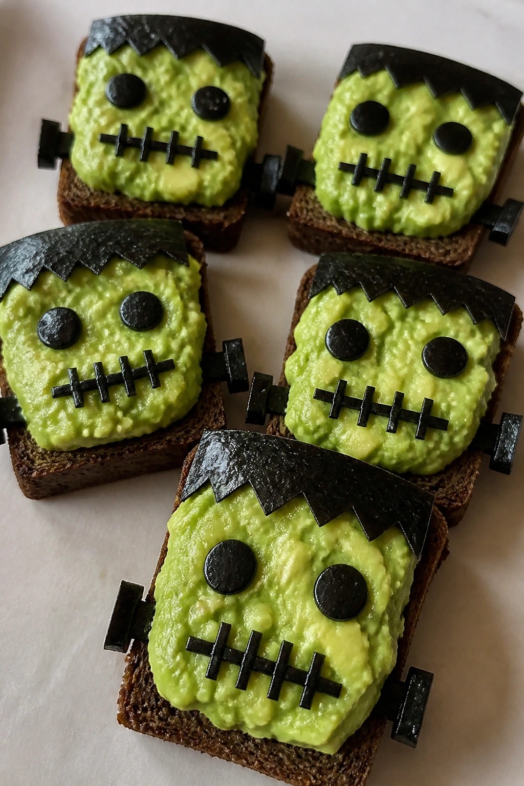 Frankenstein Avocado Toast Bites on Rye