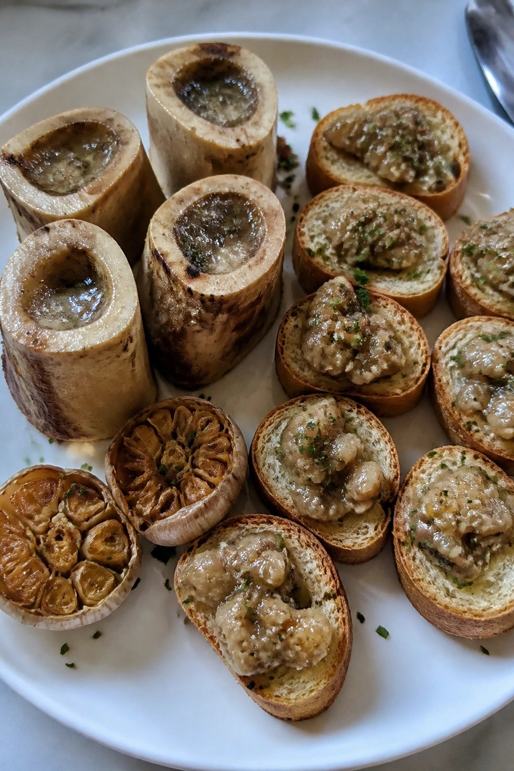 Skeleton Bone Marrow Crostini with Roasted Garlic
