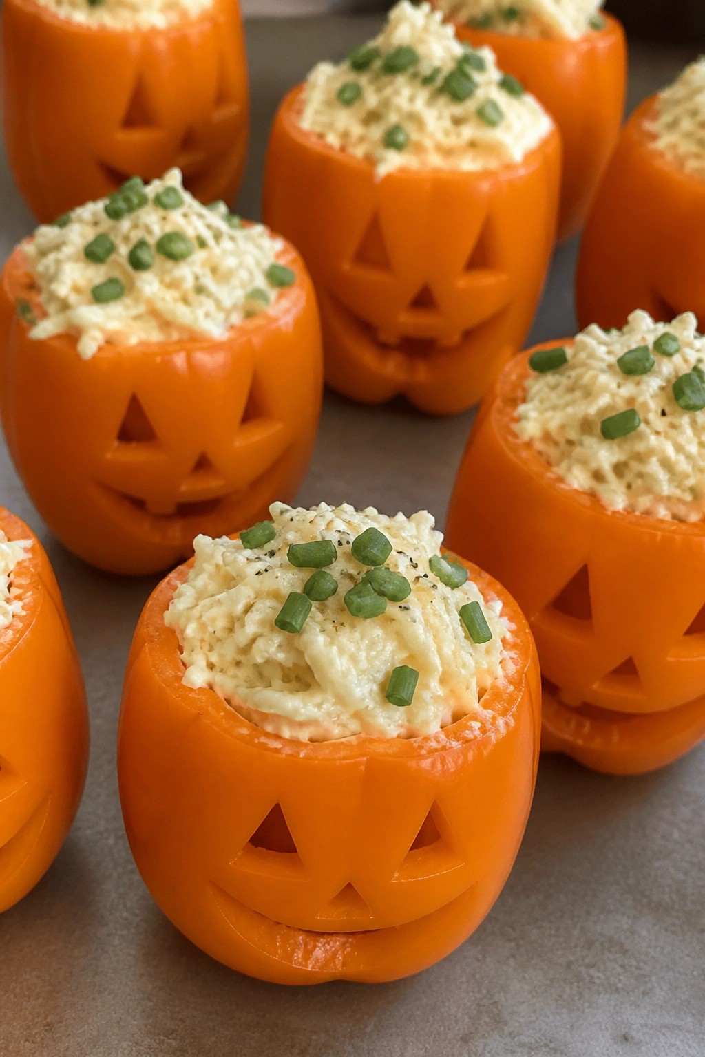 Jack-O'-Lantern Stuffed Mini Peppers