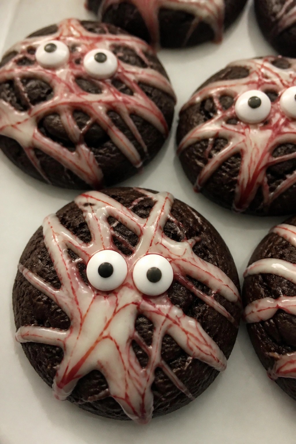 Dark Chocolate Truffle Cookies with Red Vein Icing and Eyes