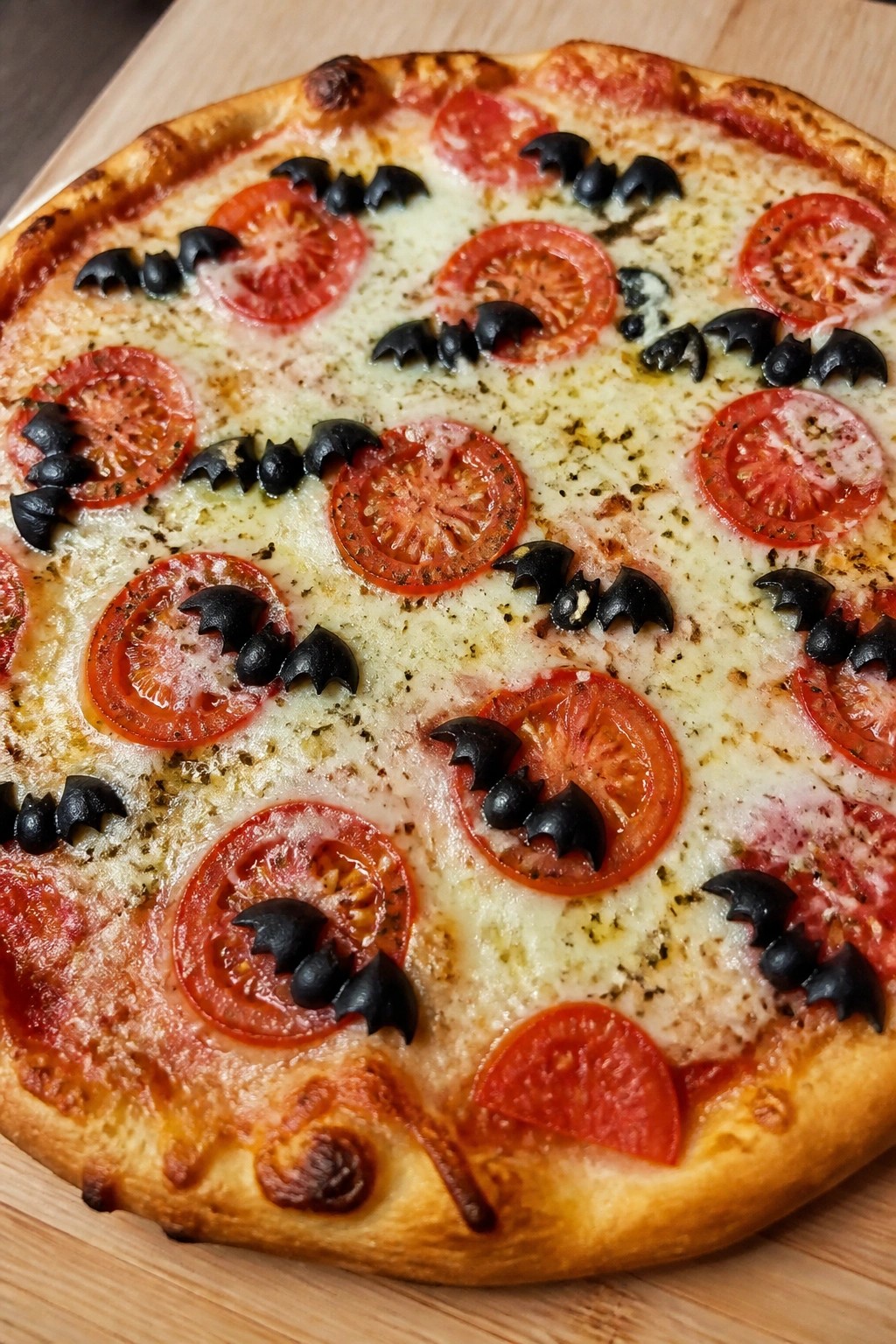 Bat Wing Black Olive and Tomato Pizza