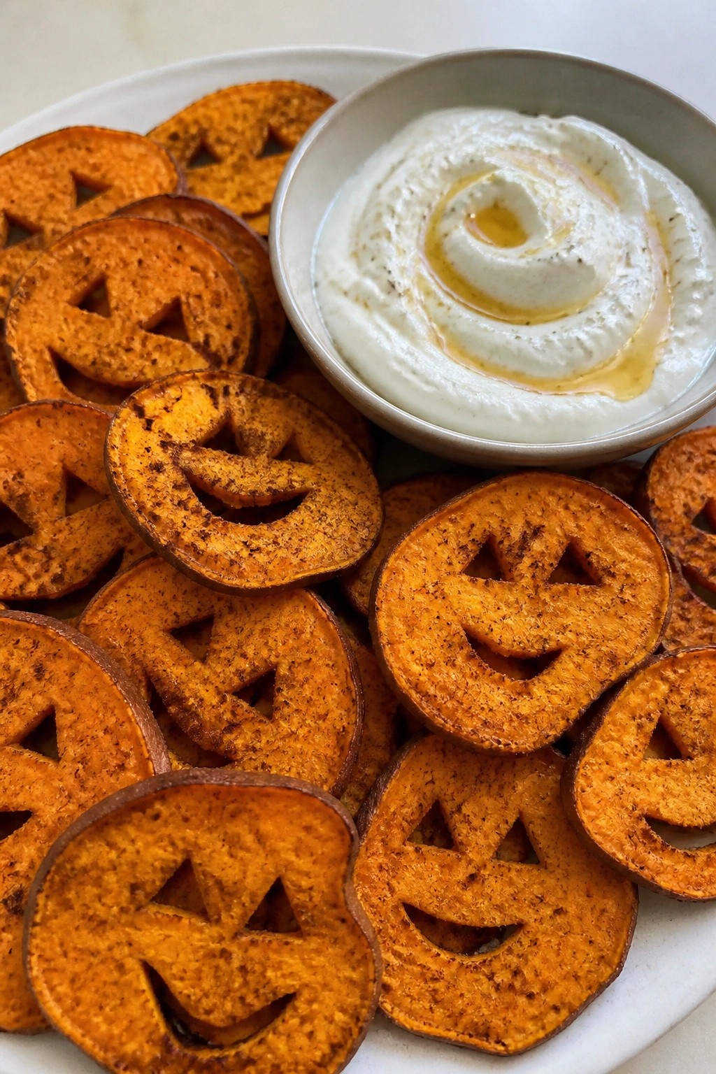 Baked Sweet Potato Jack-o'-Lantern Chips with Greek Yogurt Dip