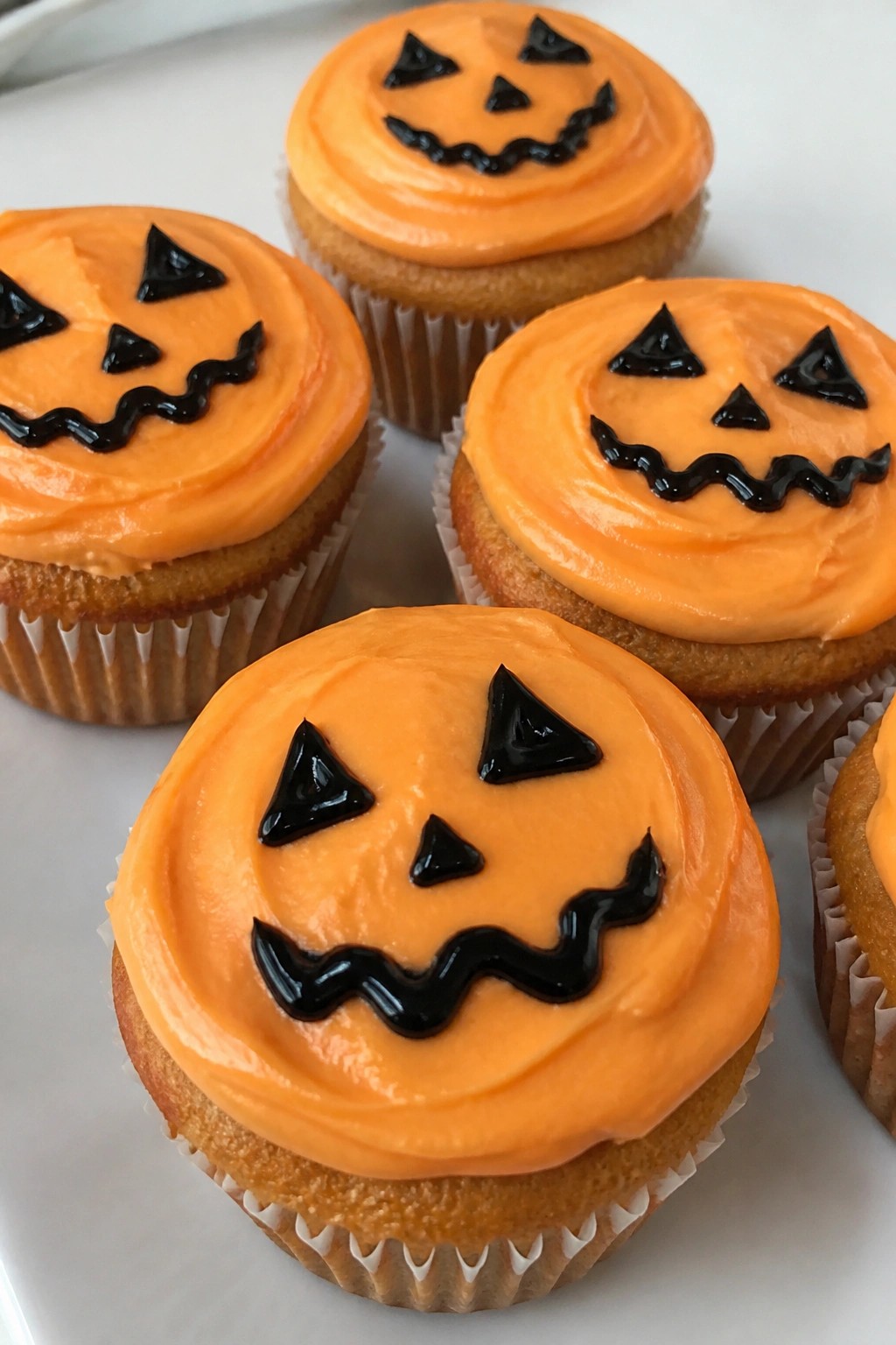 Jack-o'-Lantern Pumpkin Spice Cupcakes