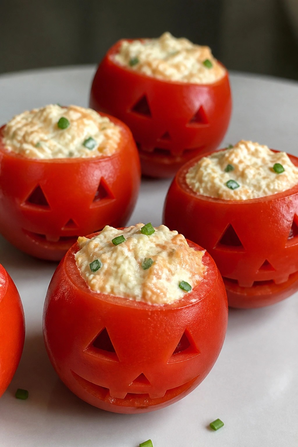 Jack-o'-Lantern Stuffed Cherry Tomatoes