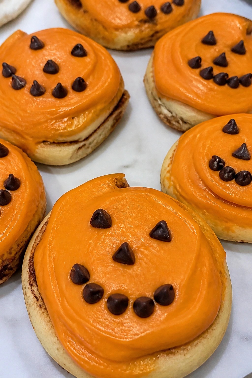 Jack-o'-Lantern Cinnamon Rolls