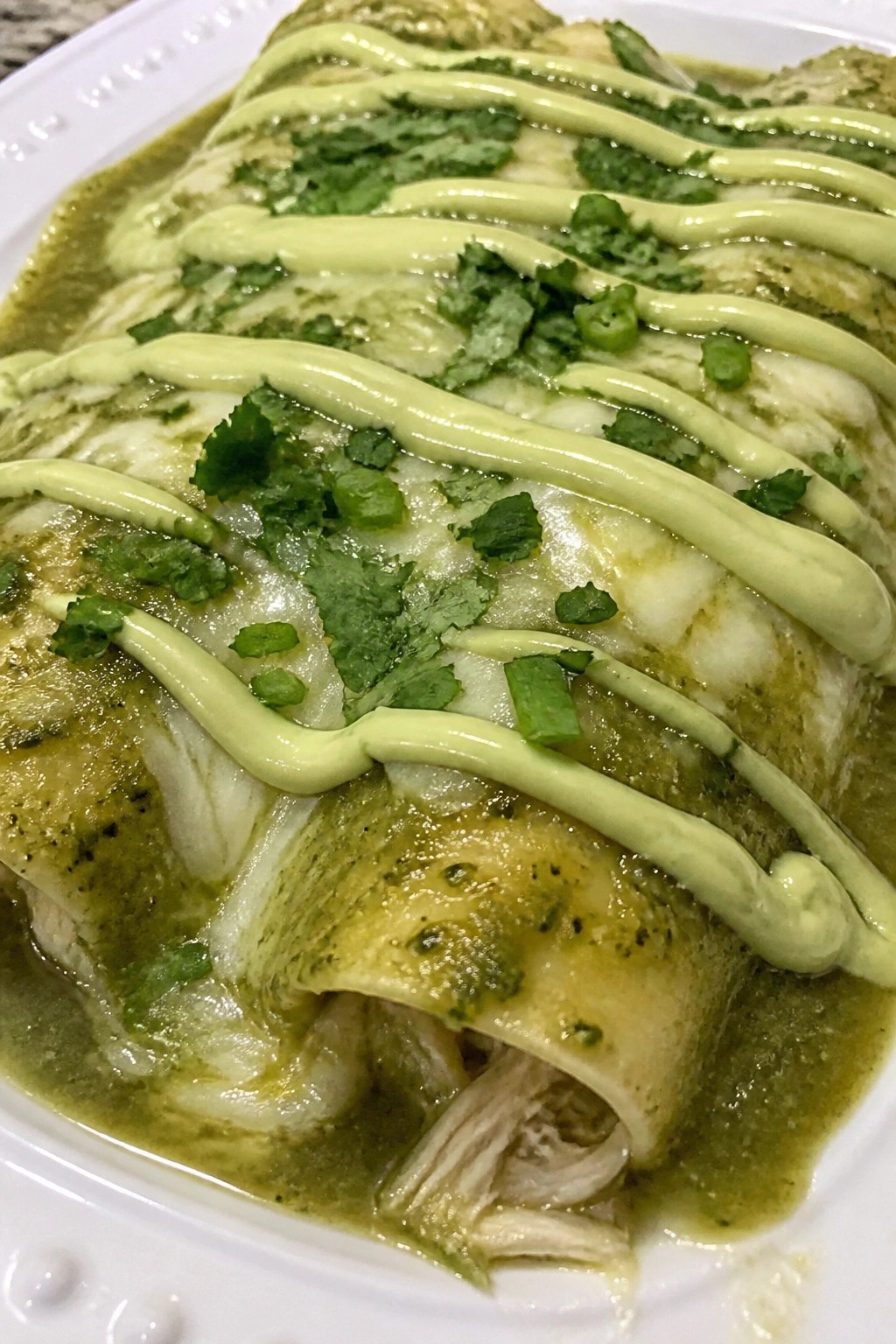 Monster Green Chicken Enchiladas with Avocado Crema