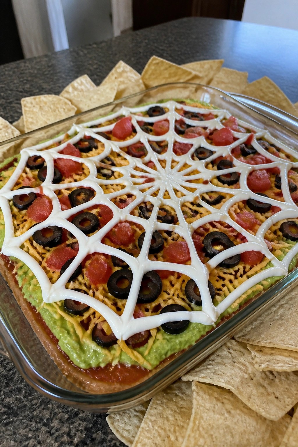 Spiderweb Seven-Layer Taco Dip with Tortilla Chips