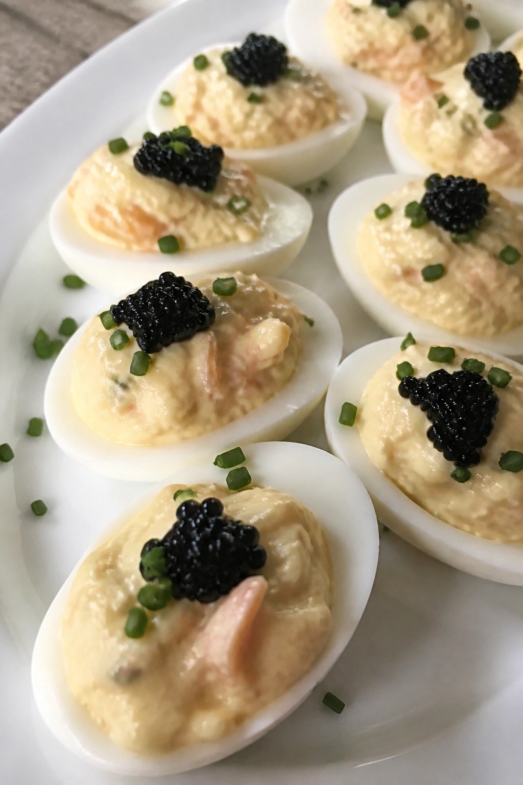 Smoked Salmon Deviled Eggs Topped with Caviar and Chives